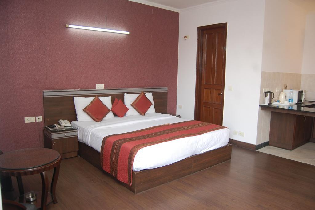 Grand Plaza Hotell New Delhi Rom bilde